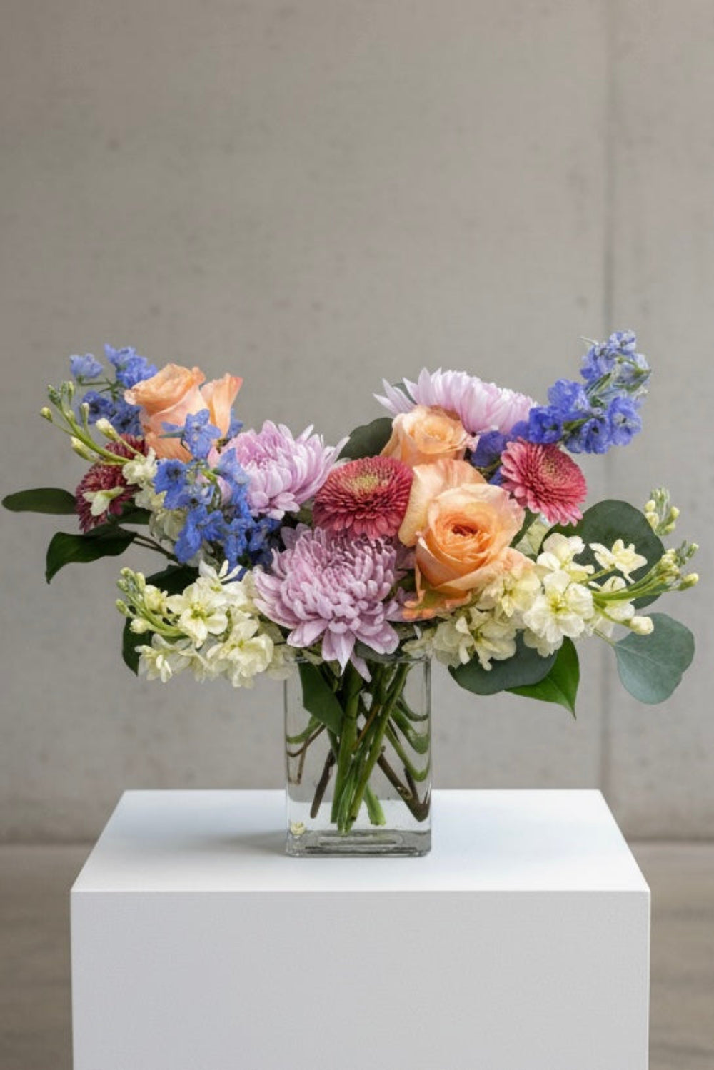 bouquet of pastel colored flowers designed in a vase, perfect for delivery for a birthday, baby birth, get-well