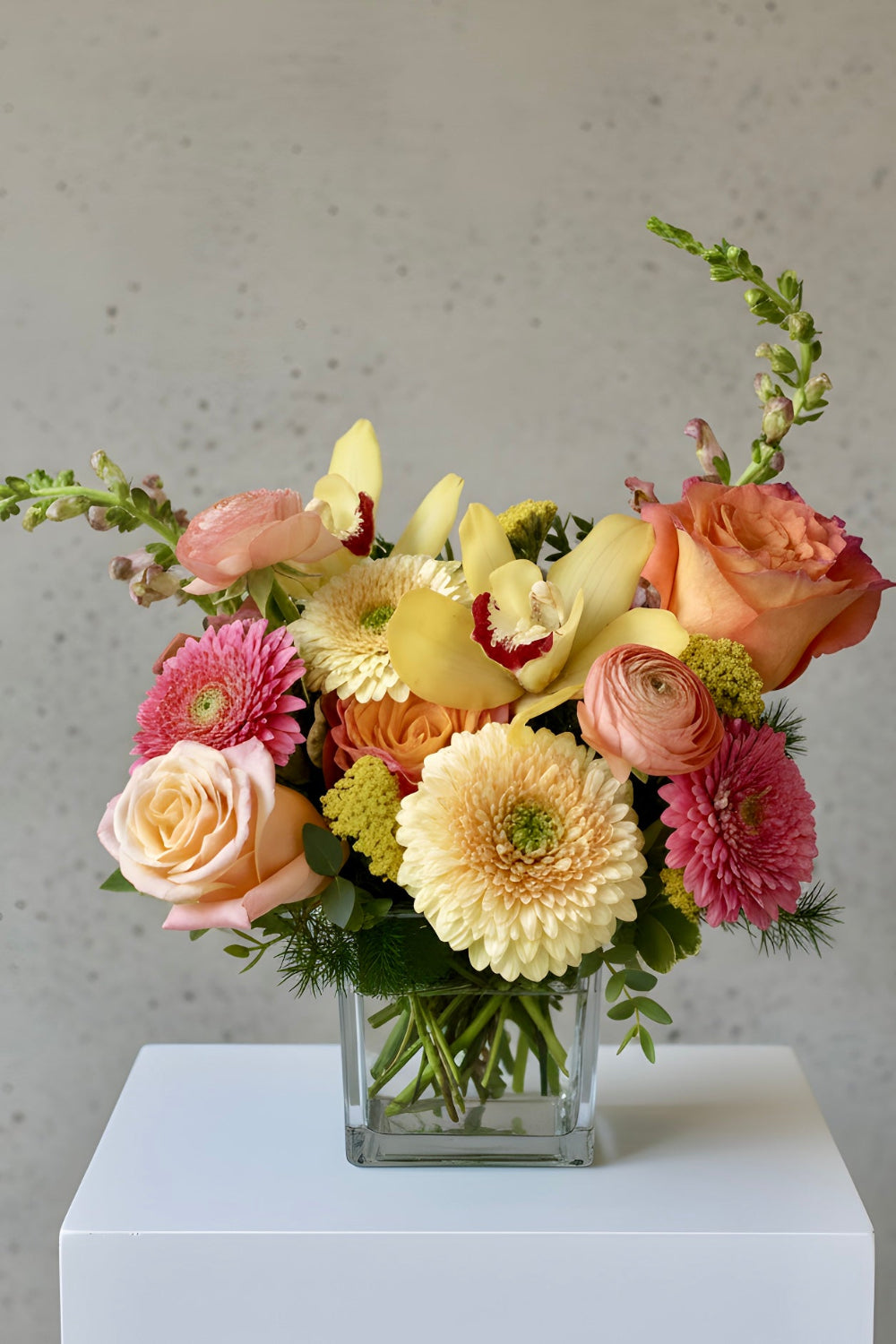 petite peach yellow pink flower bouquet with roses and germini's