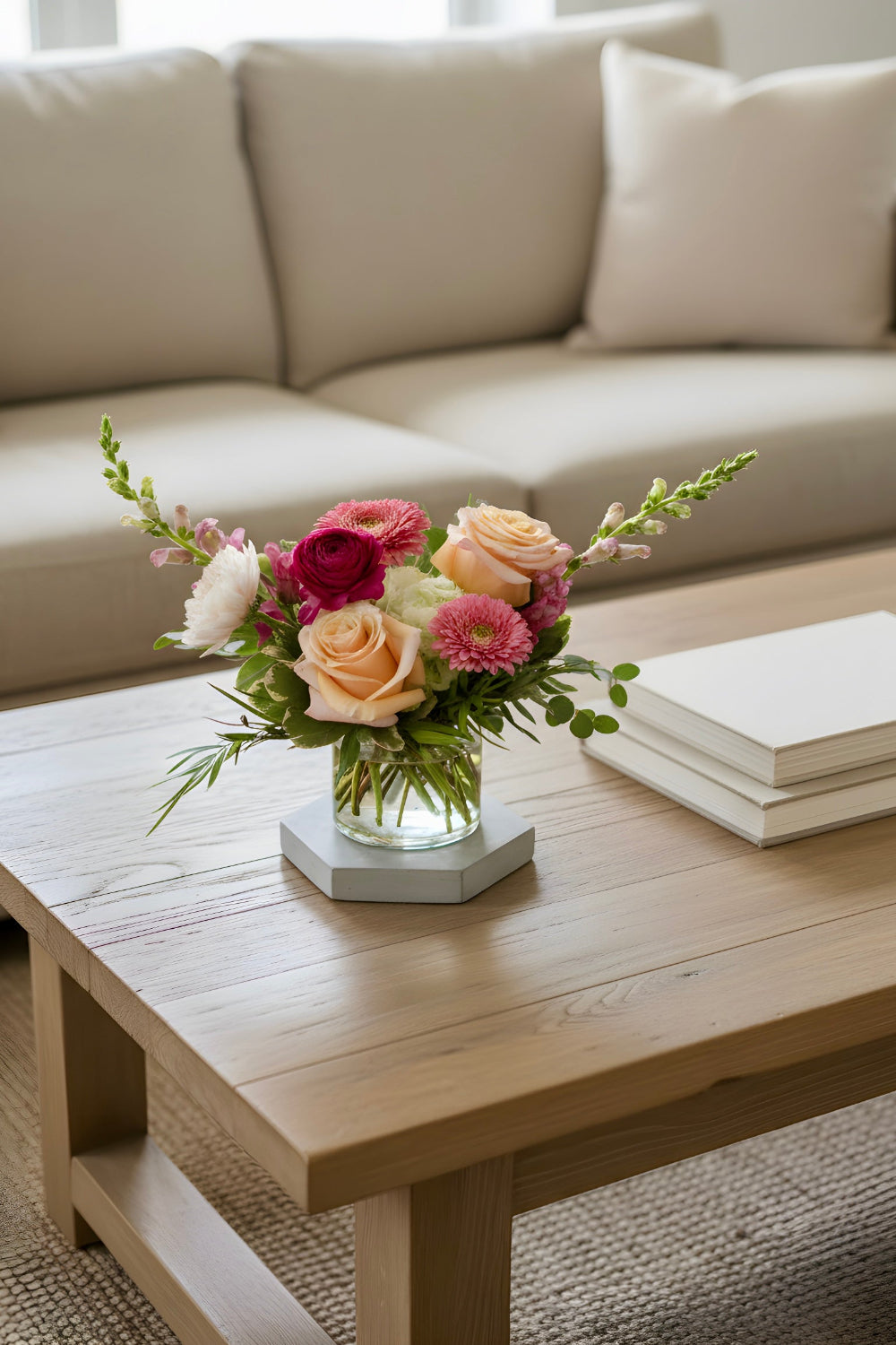 pretty pink bouquet for baby girl birth on coffee table