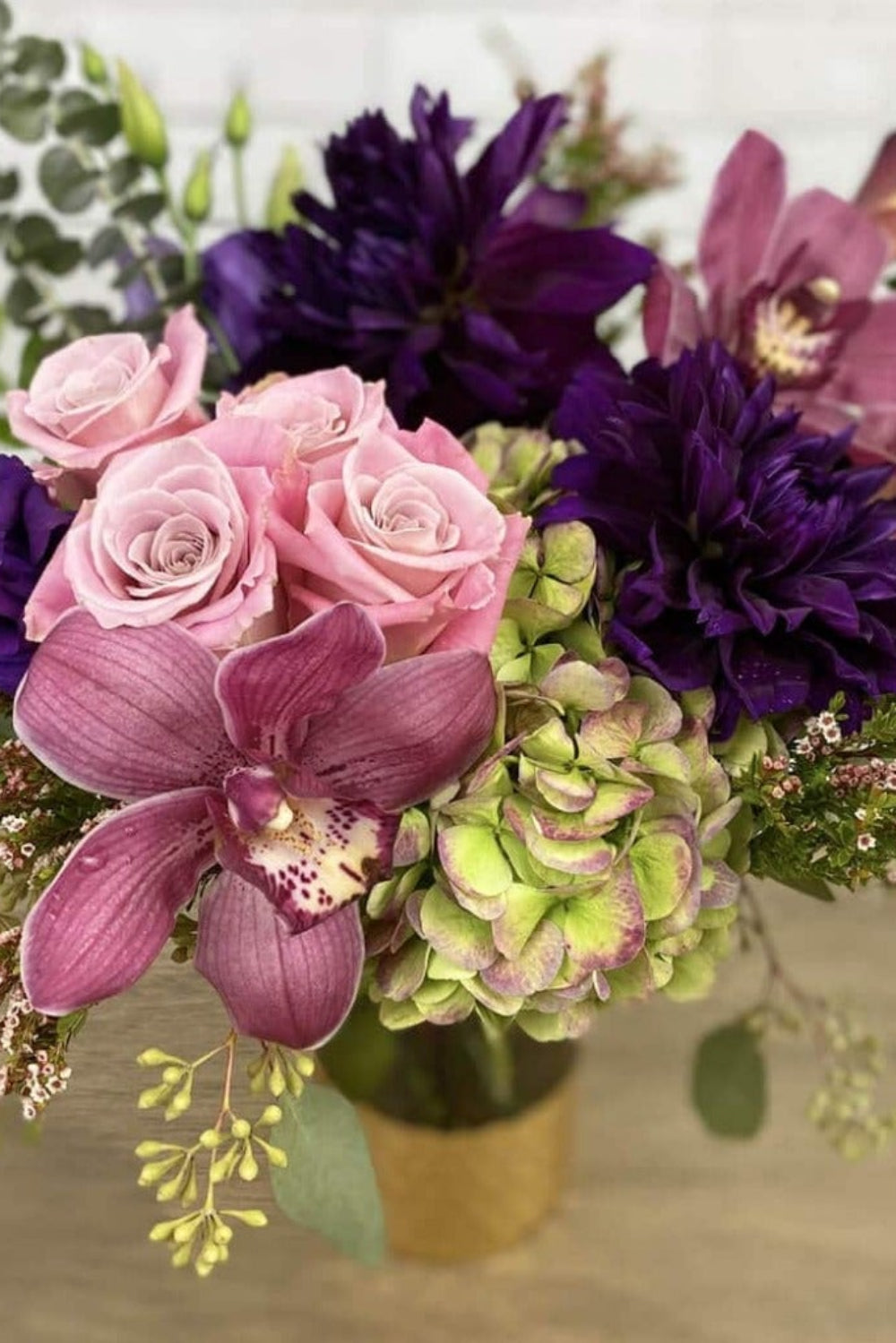 roses, orchids, hydrangea, eucalyptus, lissianthus, calla lilies